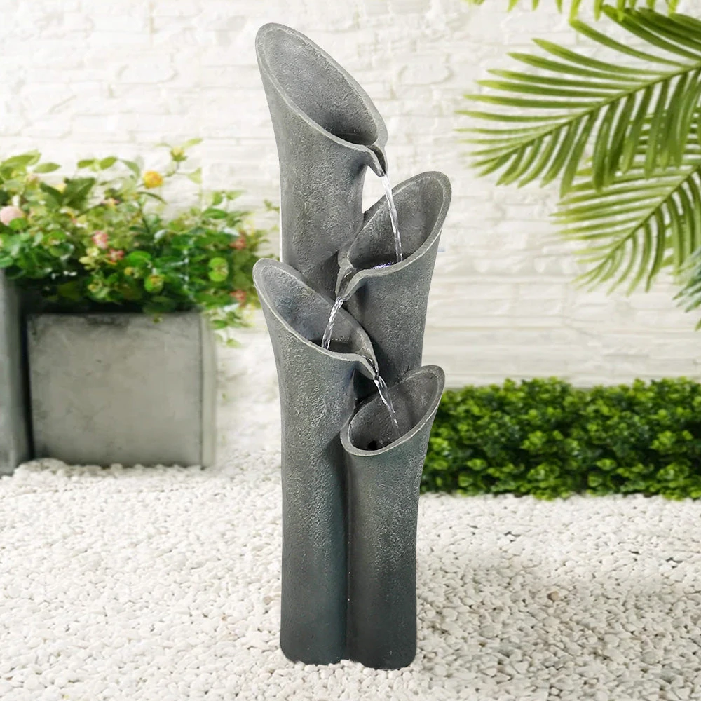 landscape ideas with fountains - side by side outdoor fountains comparison